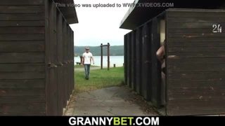 Blonde granny rides stranger's cock on public